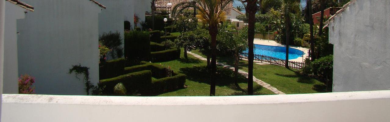 Our great apartment in a cosy little complex with tropical gardens right by the beach