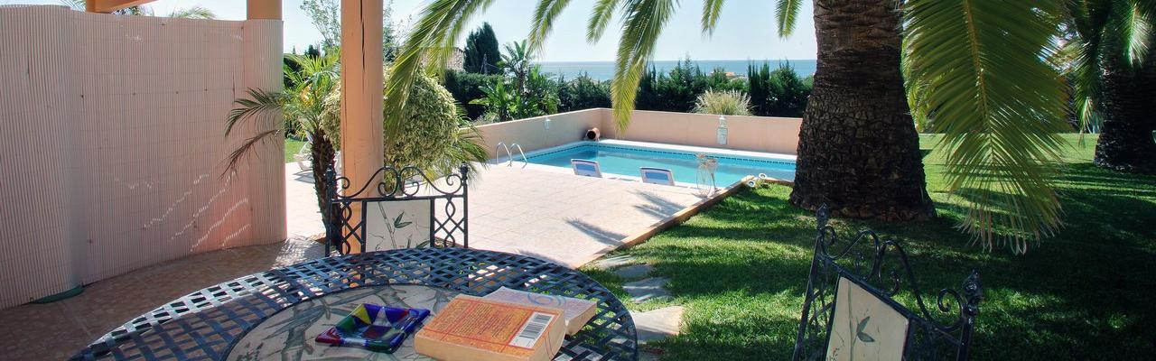 Our very special apartment with it's own fountain in the patio - in a great villa with pool and sea views