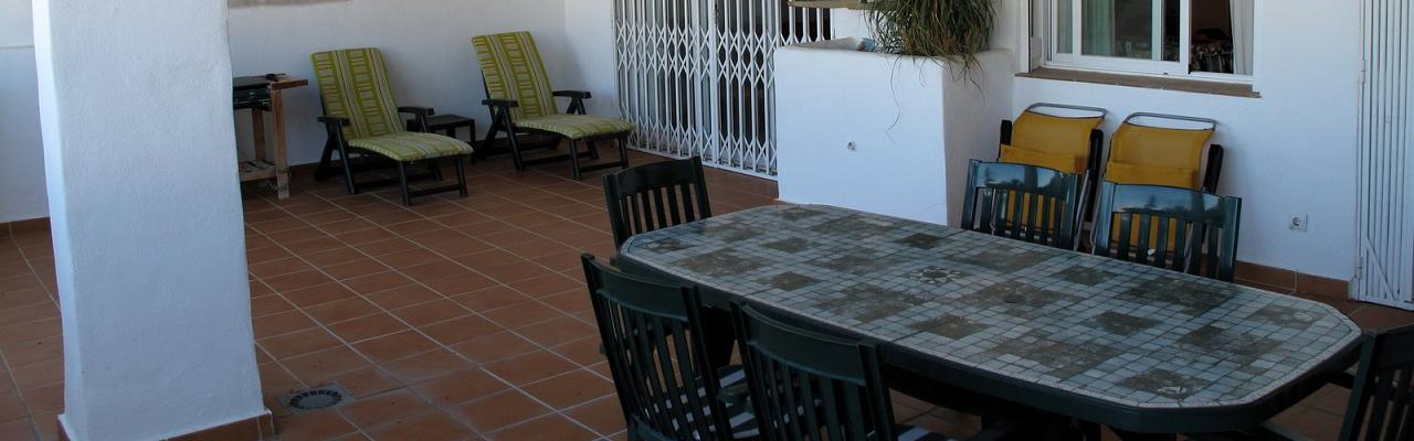 Our fine apartment on the ground floor with a beautiful wooden terrace and a great pool area